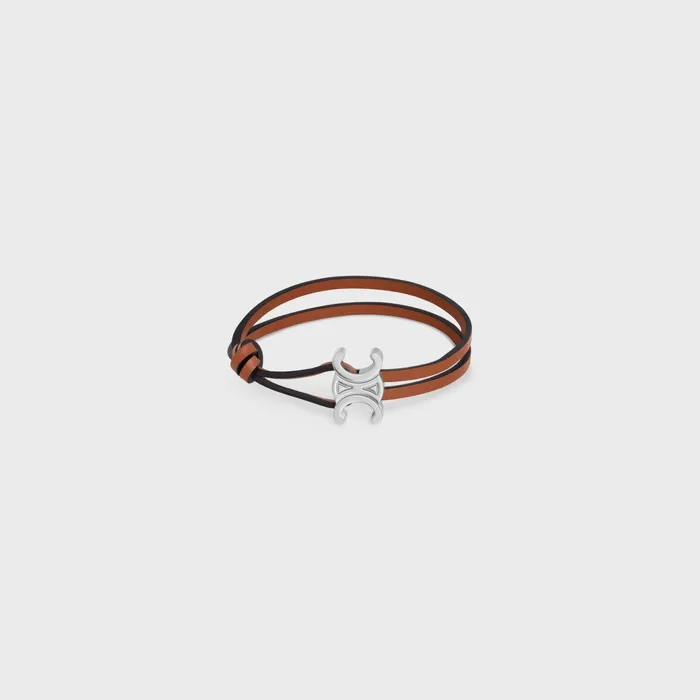 Triomphe Clasp Bracelet In Calfskin And Brass With Rhodium Finish Tan Silver Men CELINE BRACELETS and RINGS Triomphe Clasp Bracelet In Calfskin And Brass With Rhodium Finish Tan Silver Men CELINE BRACELETS and RINGS